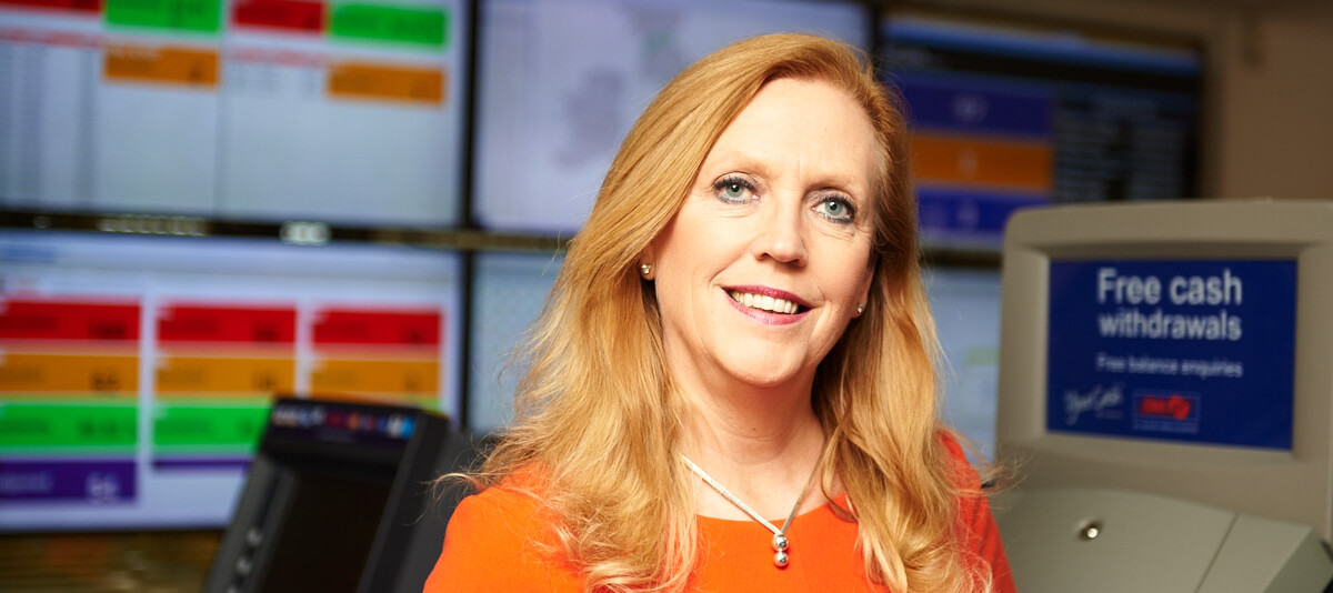 Woman leading a business team towards a positive future